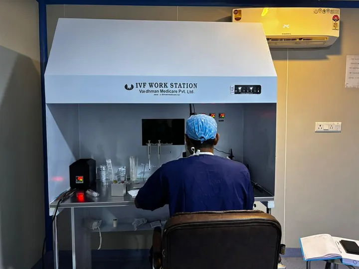 IVF workstation inside a controlled embryology laboratory